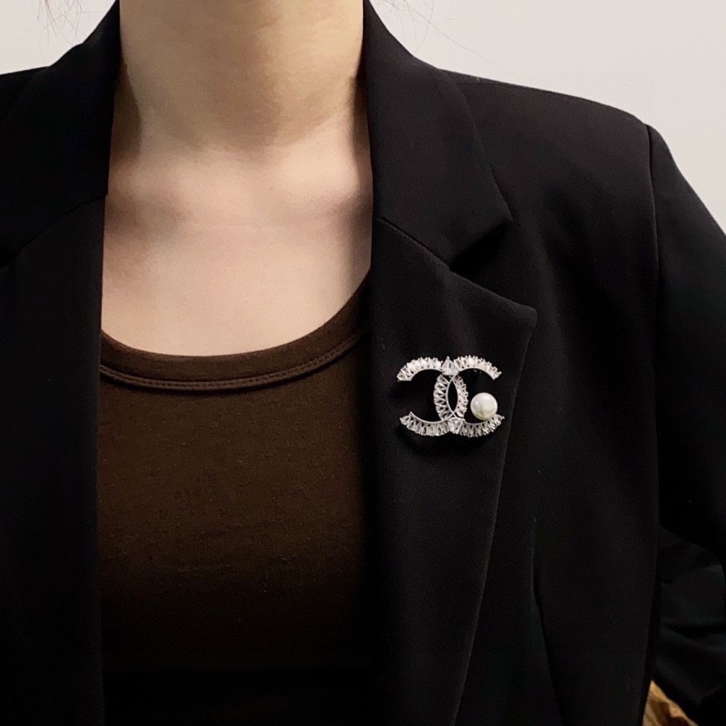 Ch**el brooches